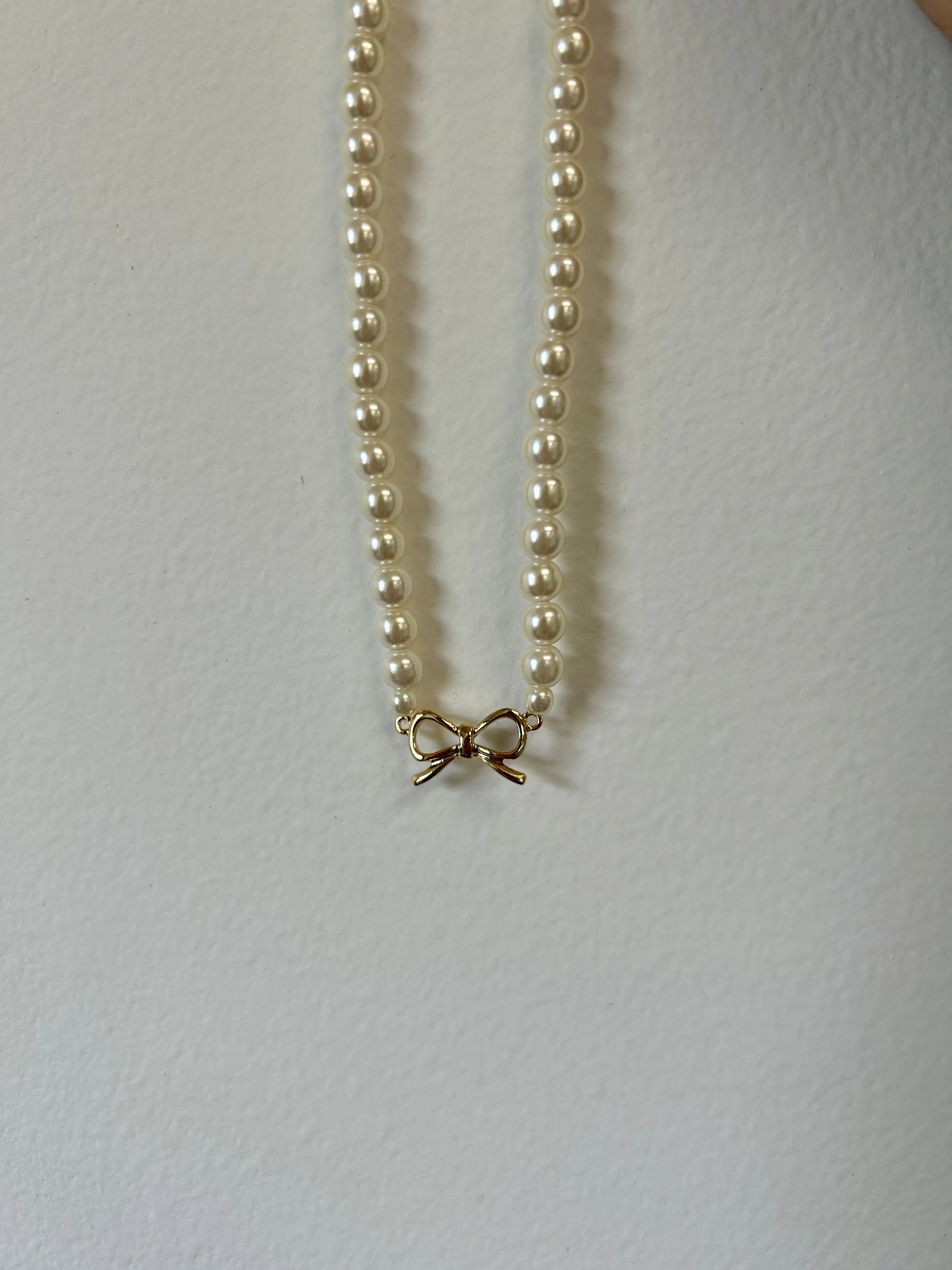 Full Pearl Necklace With Gold Bow Center Charm