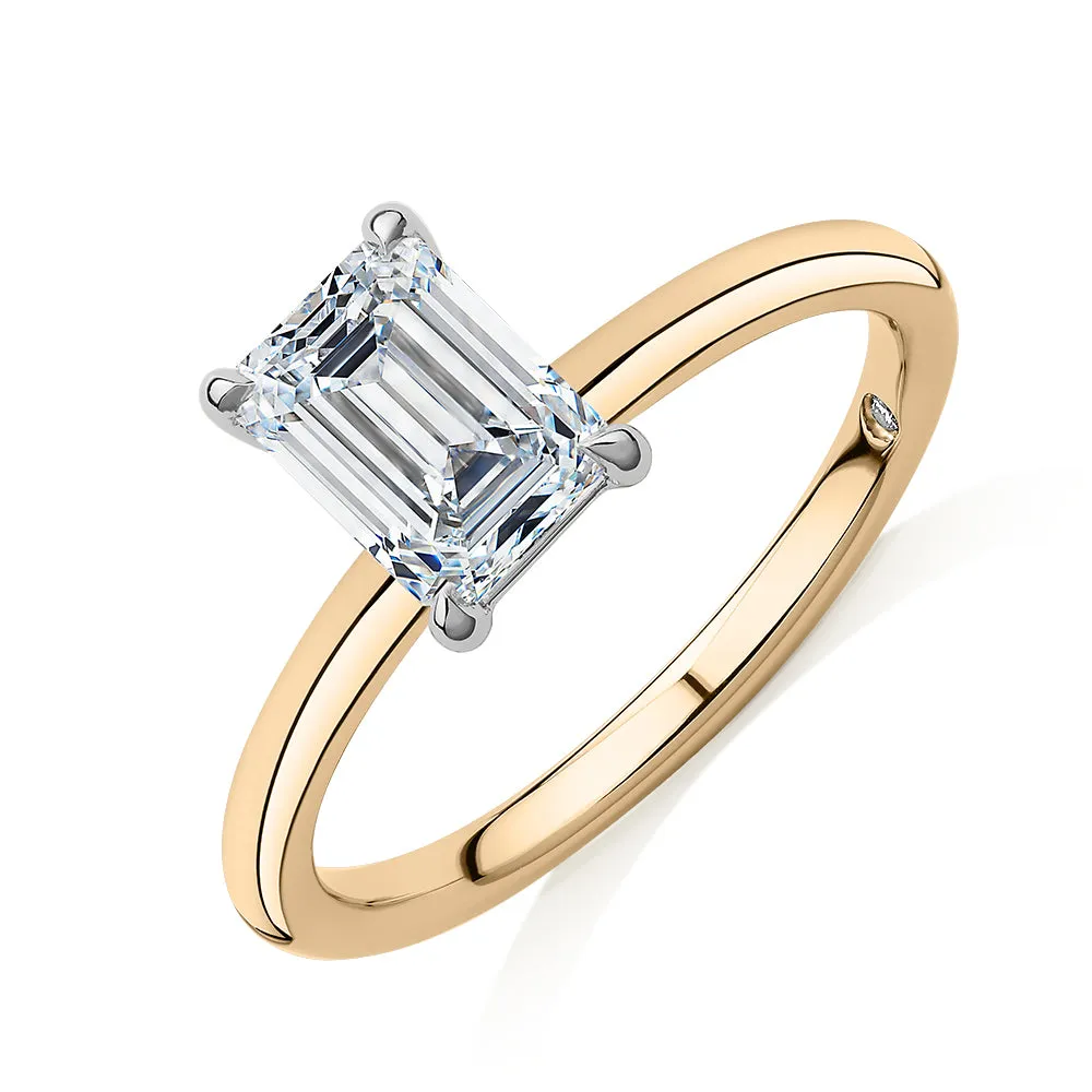 Signature Simulant Diamond 1.50 carat* emerald cut solitaire engagement ring in 14 carat yellow and white gold