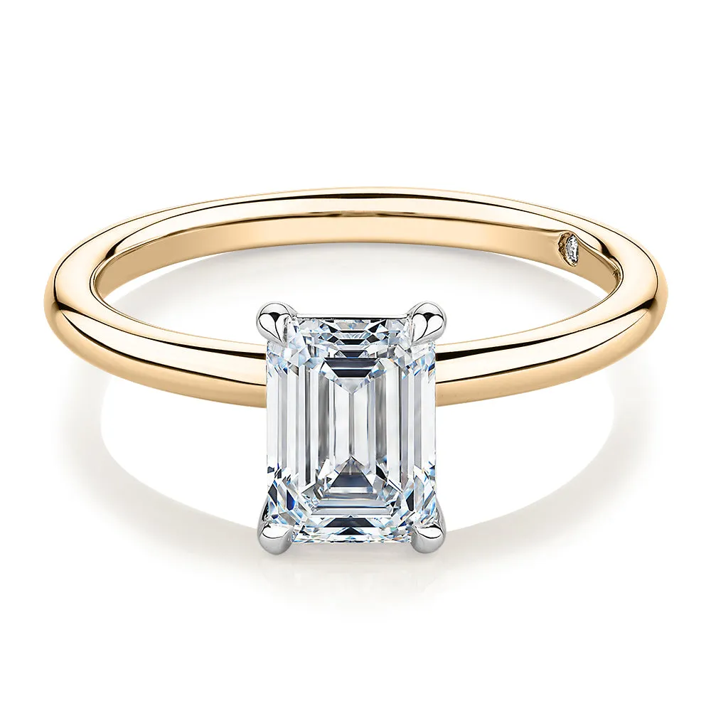 Signature Simulant Diamond 1.50 carat* emerald cut solitaire engagement ring in 14 carat yellow and white gold